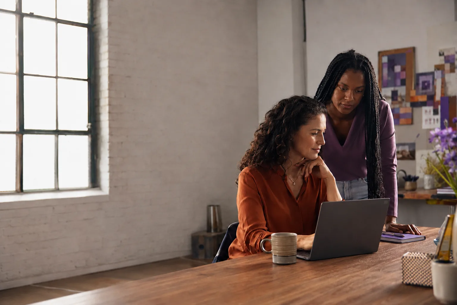 Small business team working together in a calm studio office